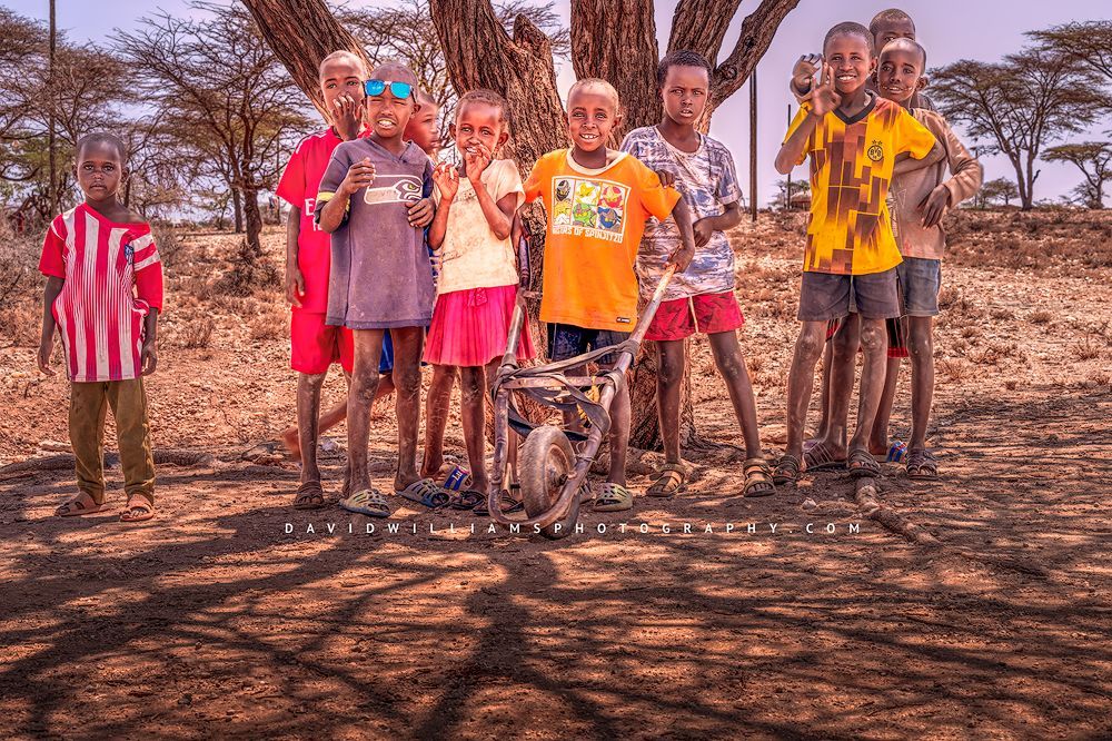 Maasai children smiling and showing their personalities, Samburu, Kenya