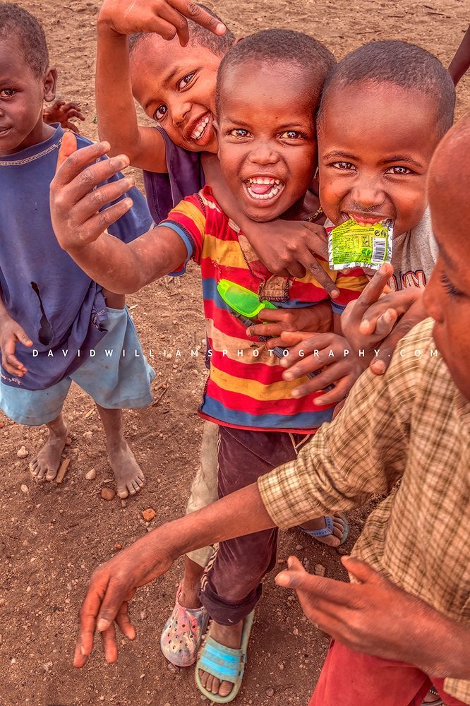 Maasai children smiling and showing personalities, Samburu, Kenya