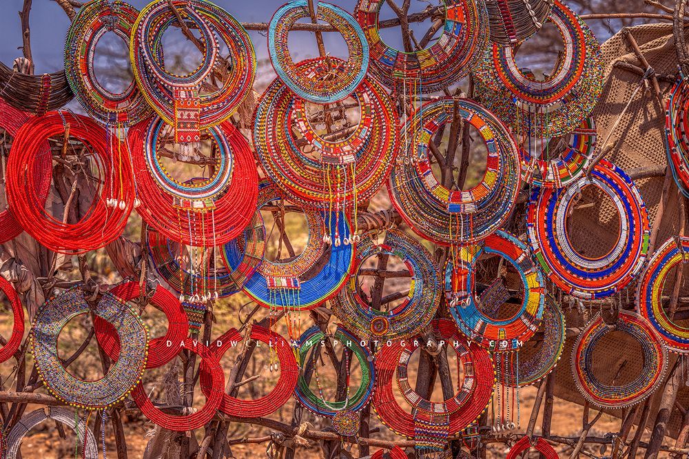 A wall of Maasai neck rings for sale by the Maasai women