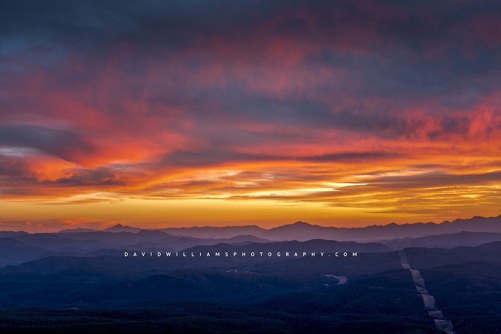 A colorful mountain sunset with pinks, yellows and blues, Arizona Desert.