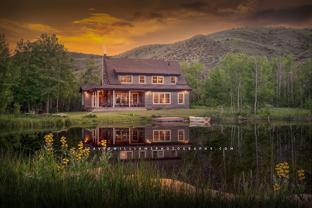 A peaceful cabin and lake under a Summer sunset, Wyoming