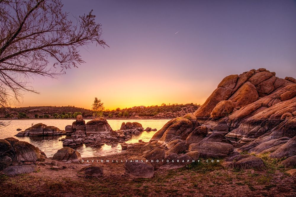 Vivid sunset over the granite formations of Watson Lake, Arizona Vivid sunset over granite rocks, Watson Lake, AZ
