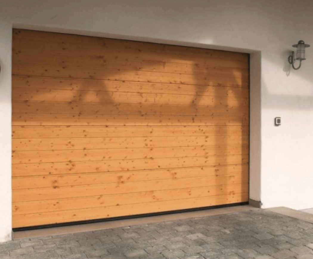 Menuiserie Vautier (95) fabrication traditionnelle de portes de garage en bois Menuiserie Vautier (95) fabrication traditionnelle de portes de garage en bois