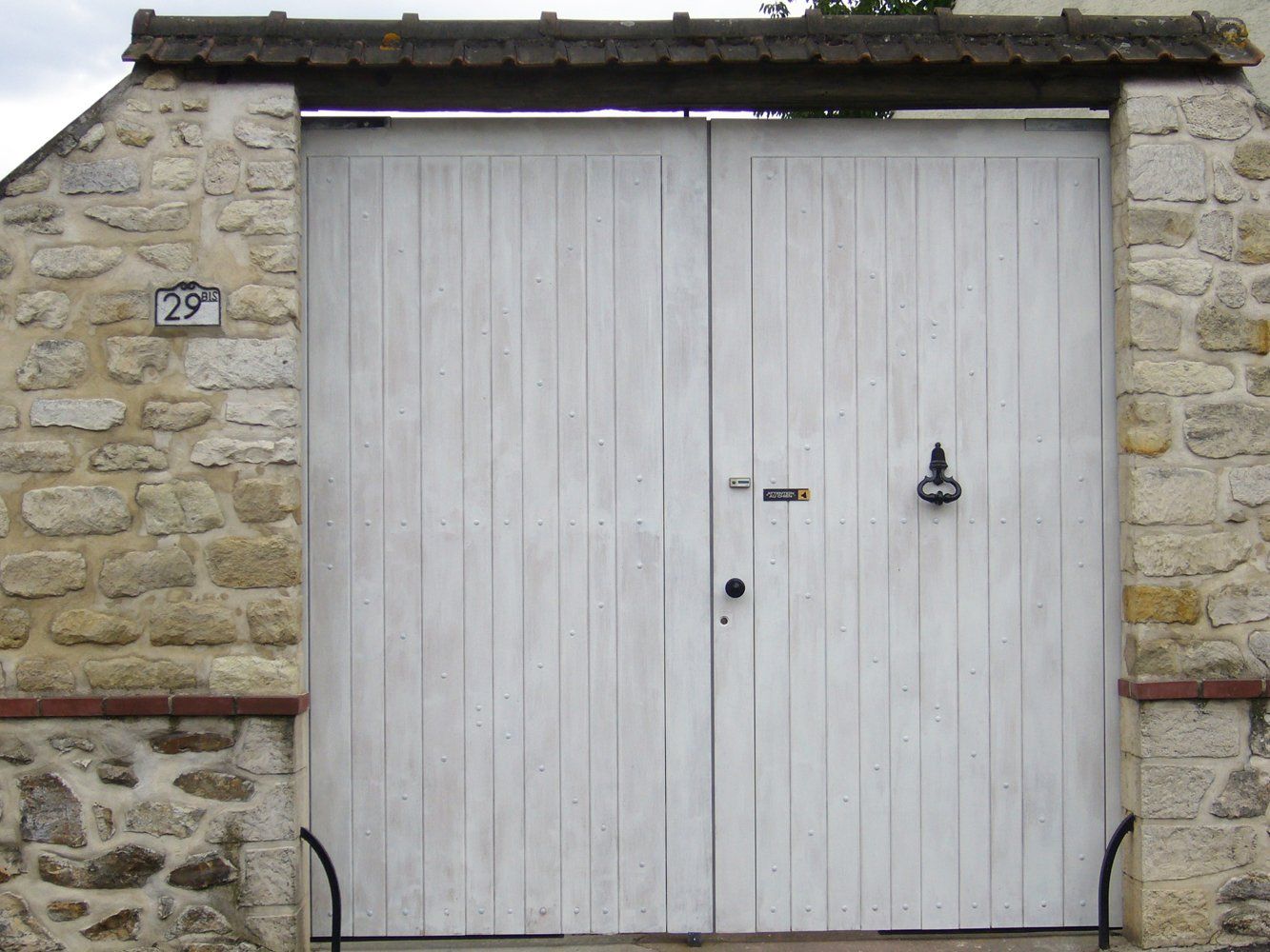 Menuiserie Vautier 95, fabrication traditionnelle et installation de portails et portes de garage, menuiserie traditionnelle