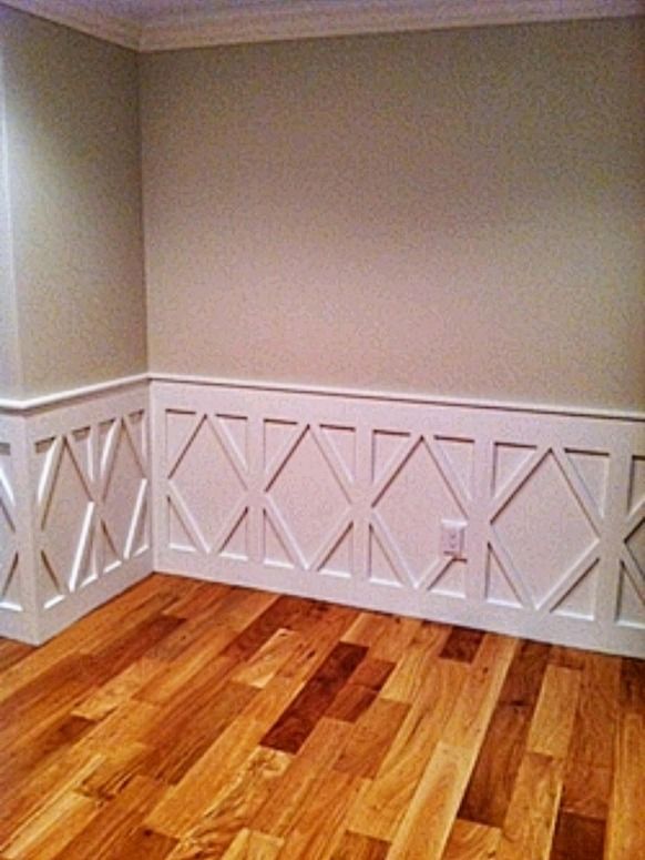 Unique diamond wainscot design by The Renovation Company applied to the lower wall