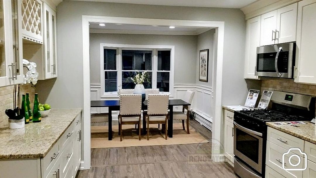 view of a widened opening in remodeled home from the kitchen to the dining room