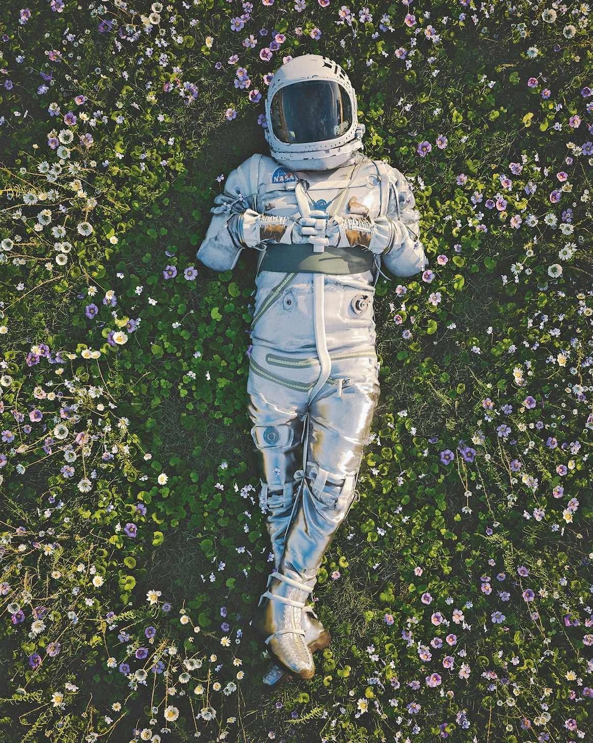 10 Artwork by Cameron Burns of an astronaut in a field of flowers. © Cameron Burns/CaptvArt - Alethea Magazine