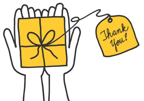 hands holding package with Thank You tag
