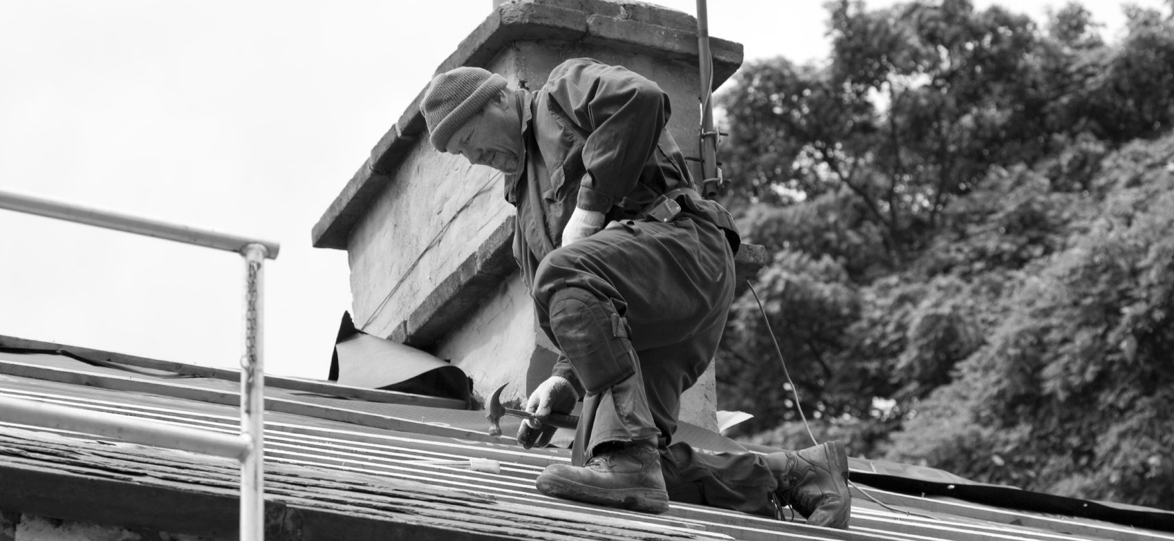 sanierung dach dämmung arbeiter afa steuern energie