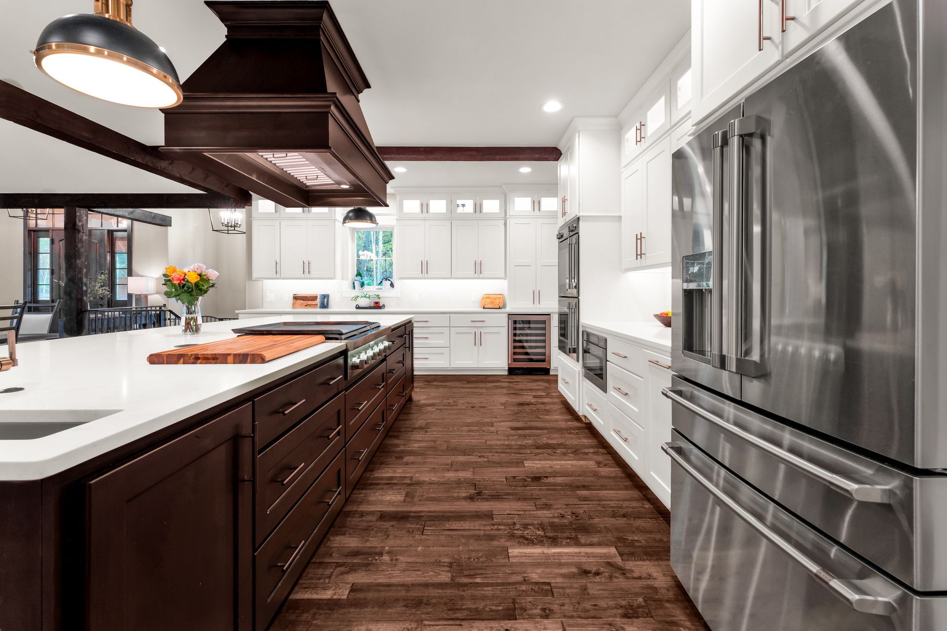 An interior real estate photo of a luxury home kitchen area. Professional photo by Jennifer White Timeless Moments Photography. Home built by Old World Cottages near Springfield Missouri.
