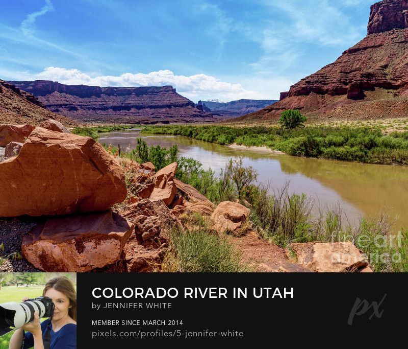 A view of the Colorado River along Byway Highway 128 in Utah with some mesa rock formations by Jennifer White with Timeless Moments Photography.