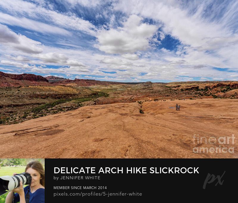 As you work your way up the large slickrock mound on your hike to the Delicate Arch, if you turn around, this is one of the beautiful desert valley views you'll see. This is at Arches National Park in Moab, Utah.