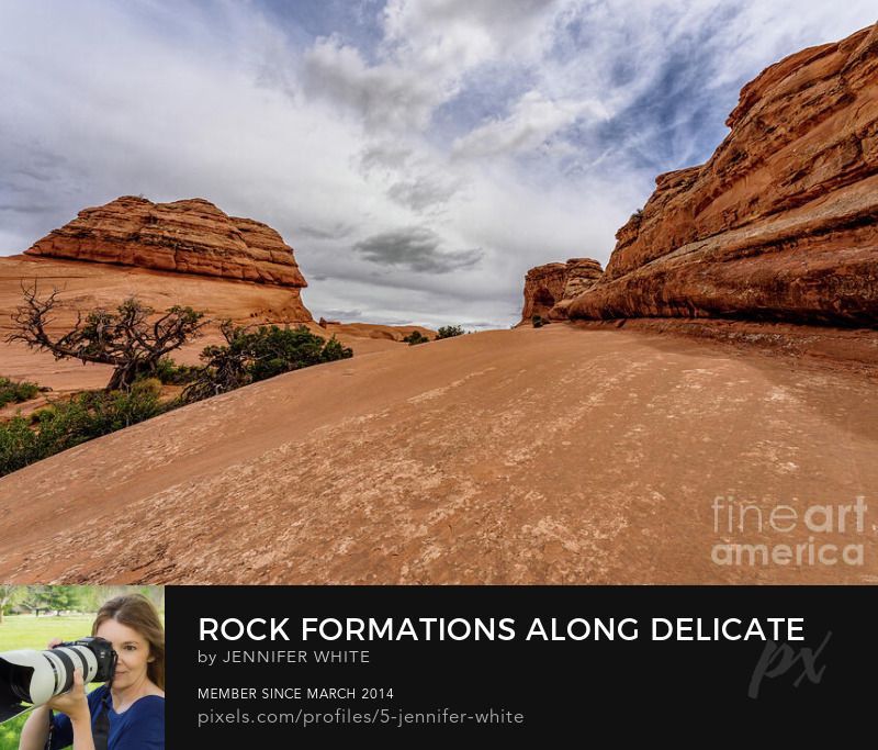 The closer you get to Delicate Arch, the more challenging the trail gets as you walk up the slickrock. This is located at Arches National Park in Moab, Utah