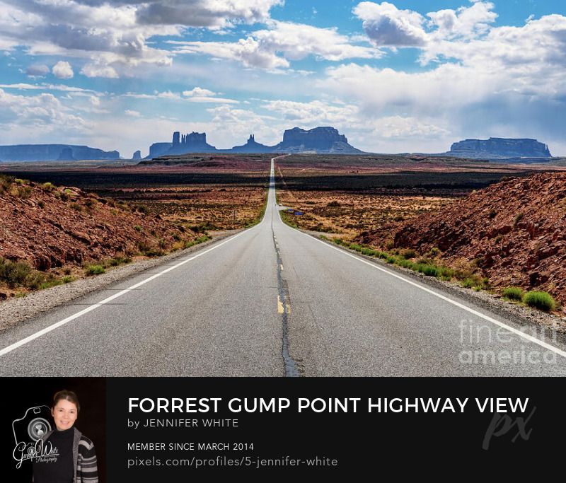 A view looking down US 163 Highway towards a group of hazy Mesa and Butte Mountains at the border of Utah and Arizona from the popular tourist viewpoint known as Forrest Gump Point. The movie, Forrest Gump, was filmed in this location. Around mile marker 13, Forrest proclaimed to his followers that he was done running. When he stops he says this famous line, “I’m pretty tired. I think I’ll go home now.” Towards the left you can see the Mittens buttes rock formations and part of Monument Valley in Arizona. The view point where I'm standing is located in Mexican Hat, Utah, United States.
This photo was taken by Jennifer White with Timeless Moments Photography. All images are copyrighted © Timeless Moments Photography/Jennifer White. All rights reserved.