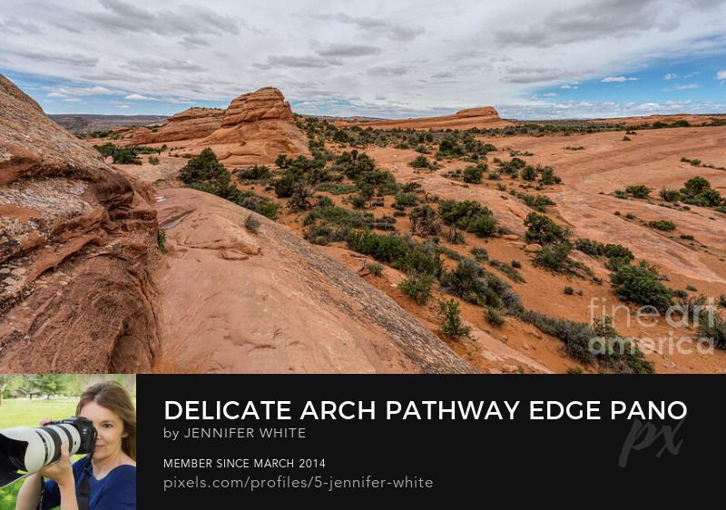 A panorama view of the narrow mountain pathway to Delicate arch in Arches National Park.