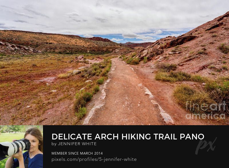 A panorama view of part of the hiking trail to Delicate Arch in Arches National Park. This part of the trail curves like a snake and is dirt.