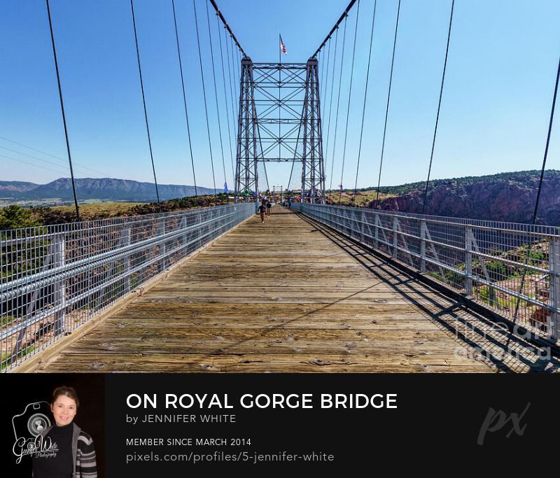 Standing in the middle of the Royal Gorge suspension bridge in Cañon City, Colorado, United States. This is America’s highest suspension bridge that suspends close to 1000 feet over the Arkansas River.