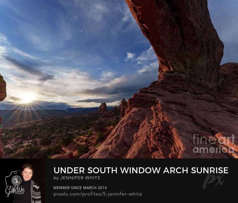 A morning sun star of rays glows as it peaks out from behind the clouds while I was standing underneath the South Window Arch rock formation. This is located in the Windows Section in Arches National Park in Moab, Utah, United States. It was so beautiful. The partly cloudy sky added beautiful natural art to the sky. I captured different angles of it as I climbed around on the steep rocky incline of the arch.