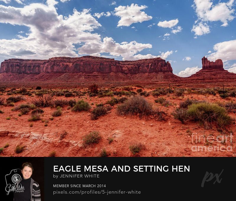 This photograph captures a breathtaking view of Eagle Mesa and the nearby Setting Hen Butte in Oljato-Monument Valley, Utah, near the Arizona border. Rising to an impressive elevation of 6,624 feet, Eagle Mesa dominates the scene with its sheer cliffs and rugged desert beauty. These mountain formations are part of the world-famous Monument Valley Navajo Tribal Park, a region celebrated for its iconic red rock buttes, mesas, and spires that have appeared in countless films, photographs, and travel guides. Easily visible from U.S. Highway 163, this timeless Southwestern landscape offers visitors a classic view of the American West, making it a must-see destination for travelers, photographers, and history enthusiasts exploring Navajo Nation lands.
This photo was taken by Jennifer White with Timeless Moments Photography. All images are copyrighted © Timeless Moments Photography/Jennifer White. All rights reserved.