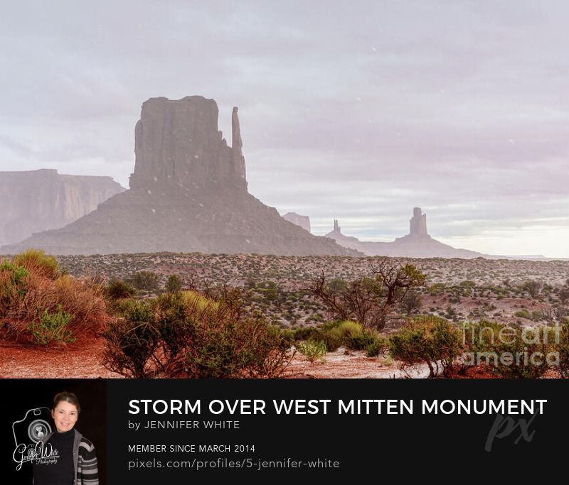 This photograph captures another view of this rare spring storm sweeping through Monument Valley Navajo Tribal Park in Arizona, as sleet, hail and even some snow fall across the desert landscape near the iconic West Mitten Butte. The storm softens the scene as distant formations, including Big Chief, King on His Throne, Castle, Sentinel Mesa, and Brigham’s Tomb, slowly disappear into layers of mist and falling precipitation. The desert sand below begins to show faint traces of white as hail and sleet gathers, creating a striking contrast against the valley’s normally warm, red-orange tones.
The weather changed rapidly, transforming the familiar desert into an unexpectedly cold and moody environment. A gentle haze blankets the buttes and mesas, muting colors and adding a quiet, surreal feeling to the scene. Moments like this are fleeting in Monument Valley, making the experience of witnessing and photographing such an unusual storm both humbling and unforgettable.