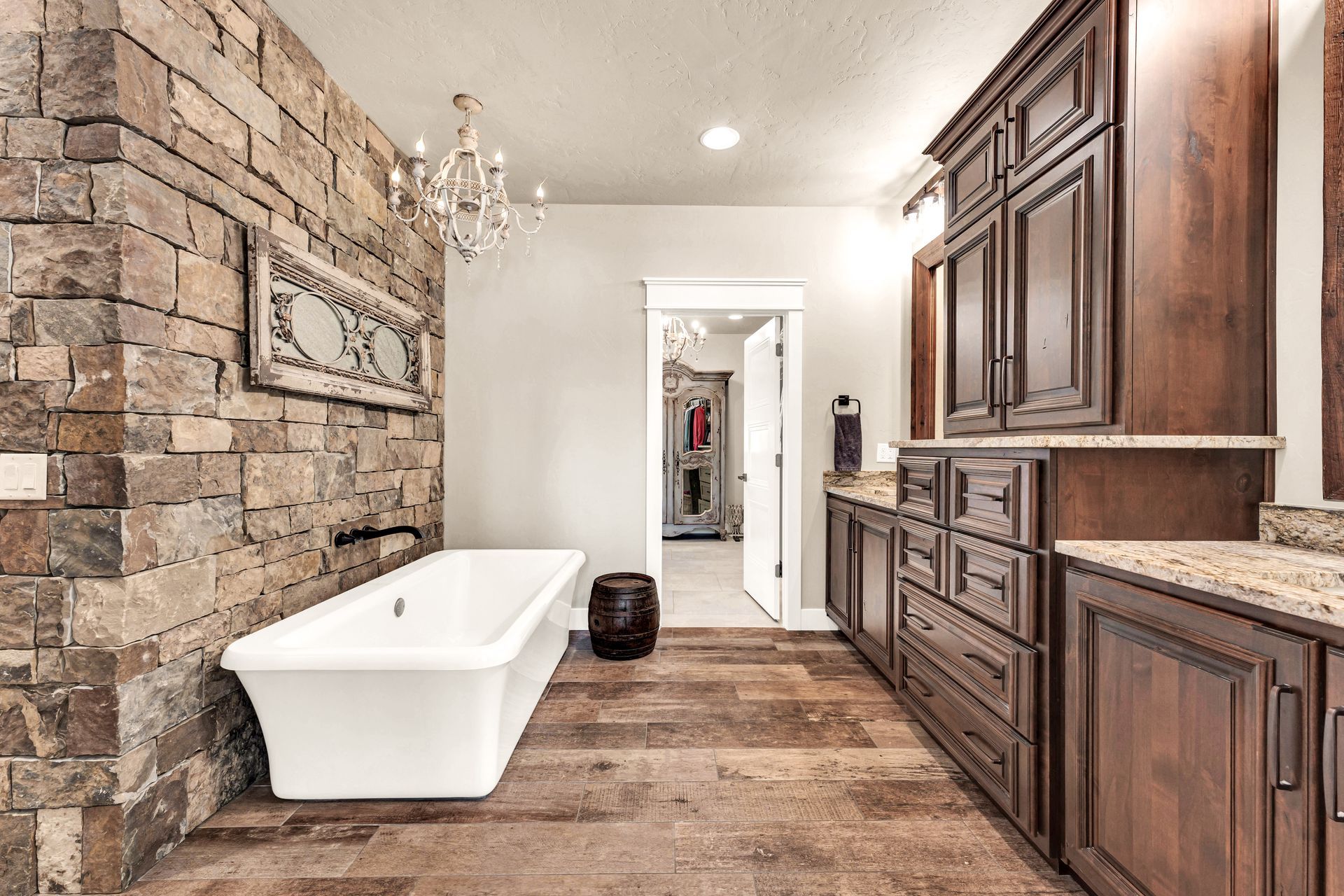 A interior professional photo of an owner's bathroom suite from a luxury home in Rogersville, Missouri. Professional photo by Jennifer White Timeless Moments Photography. Home built by Old World Cottages near Springfield Missouri.