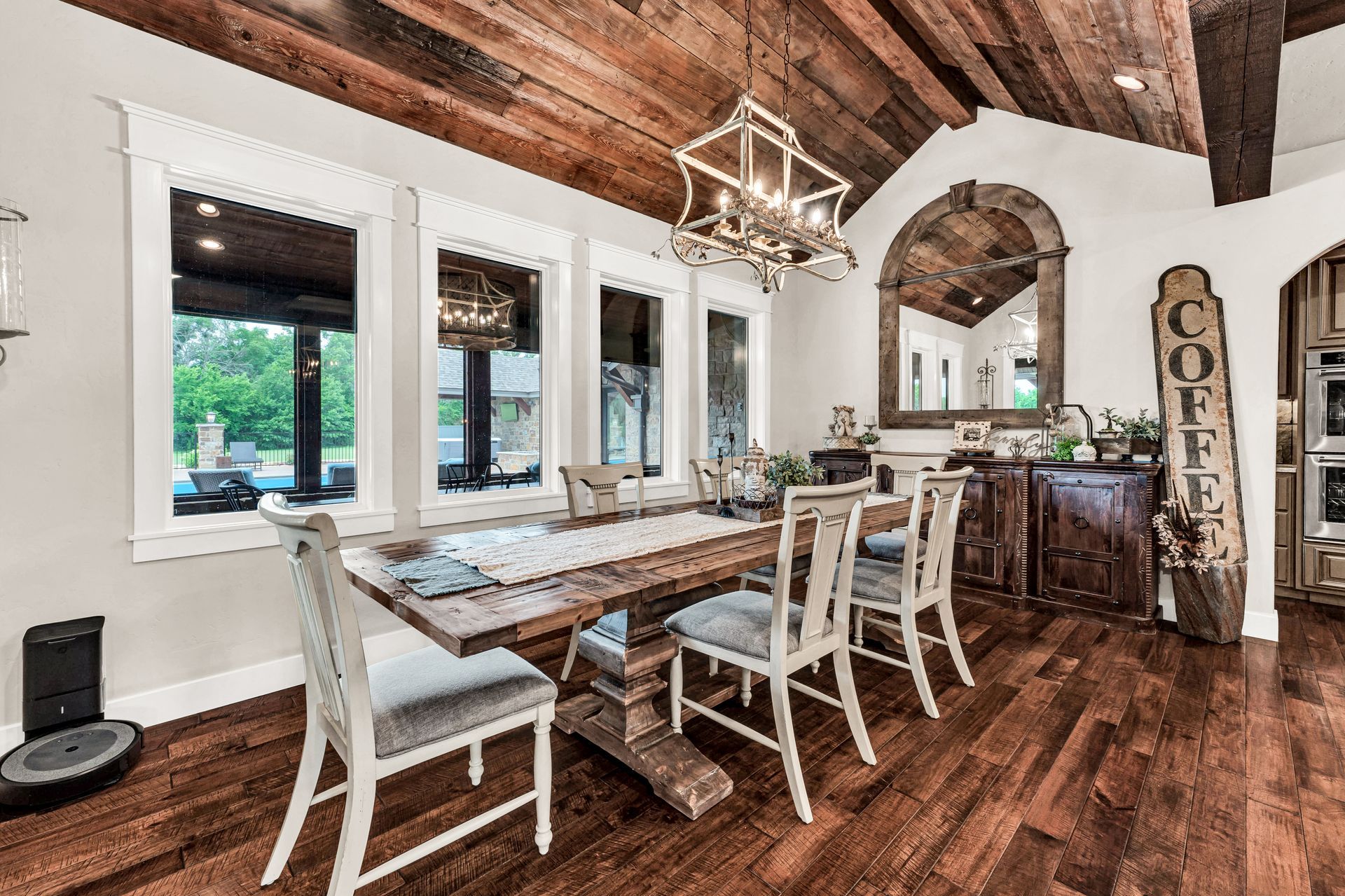 A interior professional photo of a dinning room area from a luxury home in Rogersville, Missouri. Professional photo by Jennifer White Timeless Moments Photography. Home built by Old World Cottages near Springfield Missouri.
