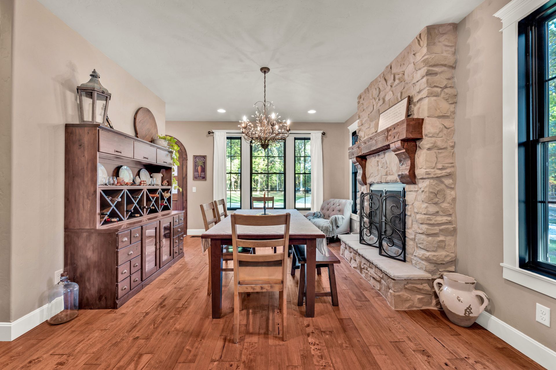 An interior dining room professional real estate photo by Jennifer White Timeless Moments Photography of a home built by Old World Cottages near Springfield Missouri.