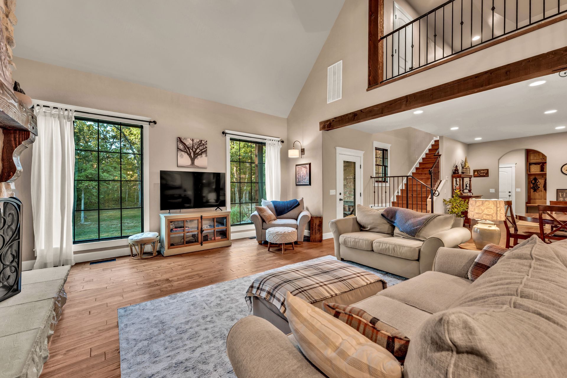 Real Estate Photography by Jennifer White Timeless Moments Photography of a home built by Old World Cottages near Springfield Missouri. This is a living room interior scene.