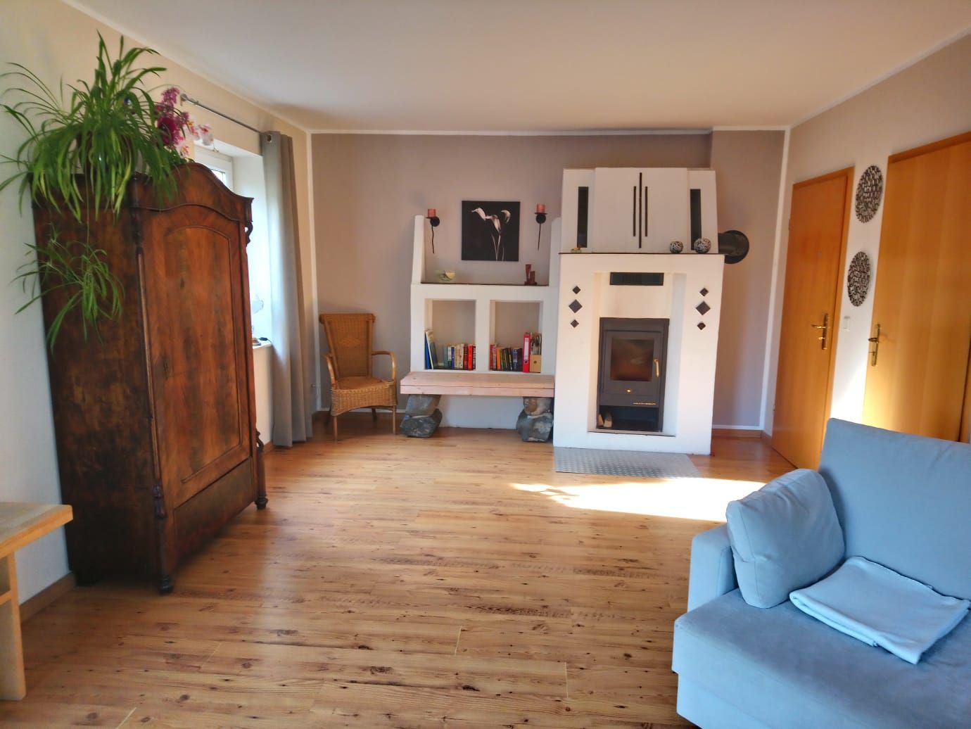 Ferienwohnung Harmonie Wohnzimmer mit Kamin