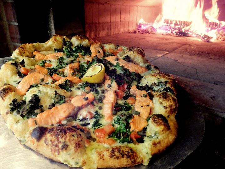 Wood fired pizza featuring Alaska caught fresh salmon ©Flying Squirrel Bakery Cafe, LLC
