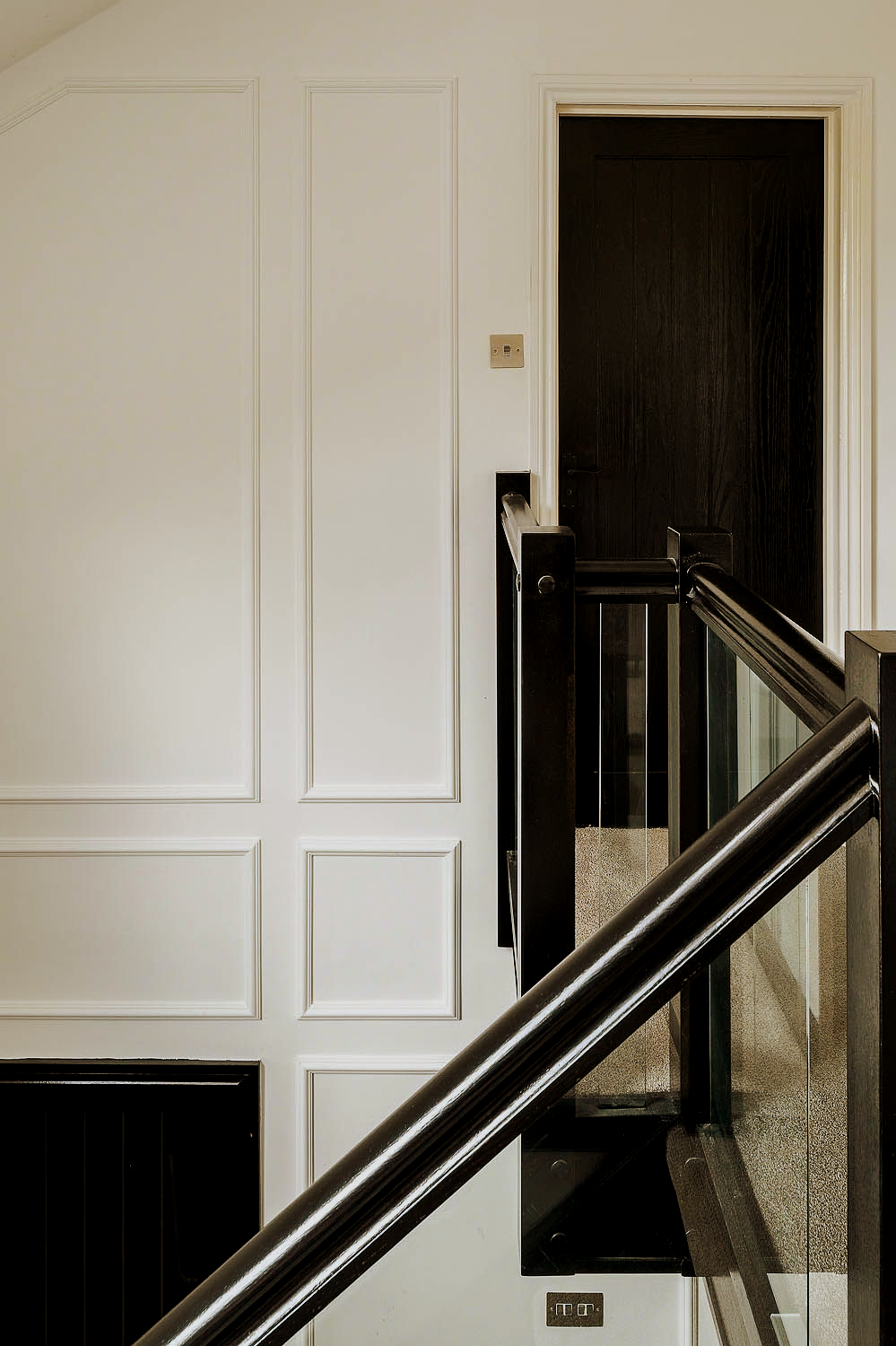 luxury entrance hall black and white with mouldings