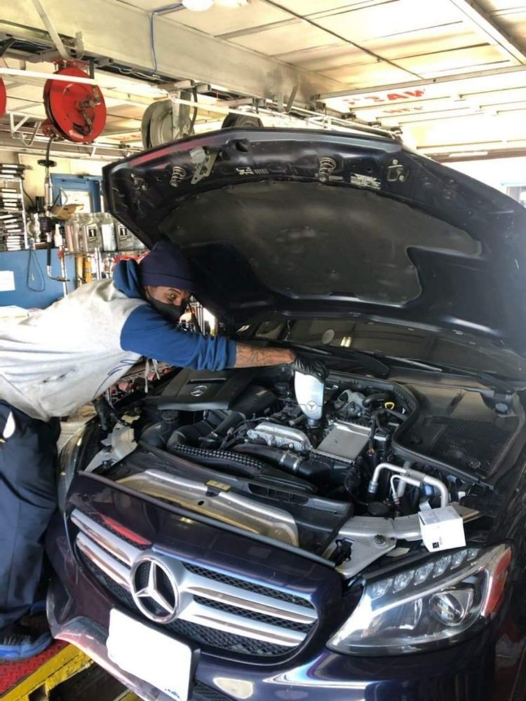 new oil being poured into a car