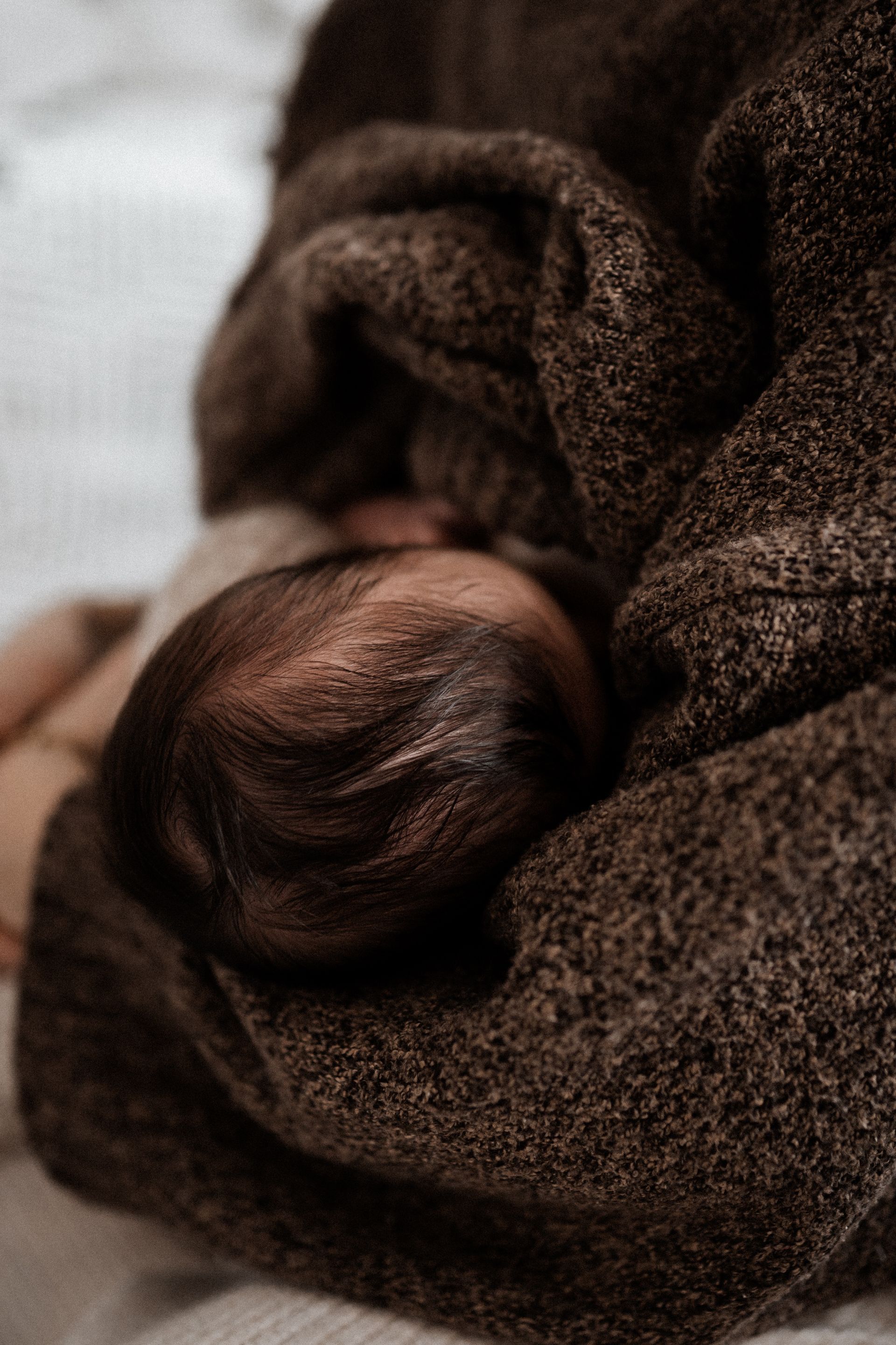 newbornshooting als homestory detailbild babyhaard