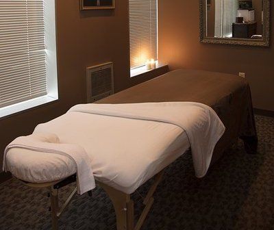Massage table at Exclusively Male Salon