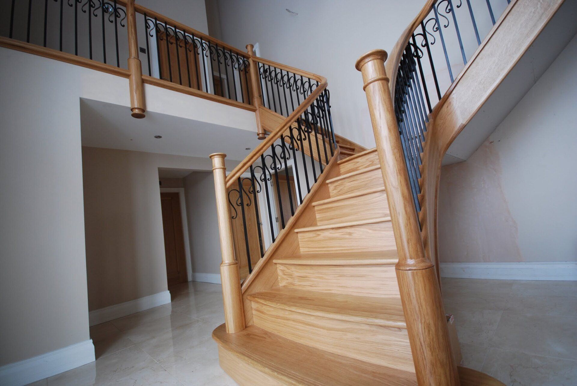 Luxury bespoke staircase manufactured and installed by H&S Joinery Ltd in Blackburn Lancashire