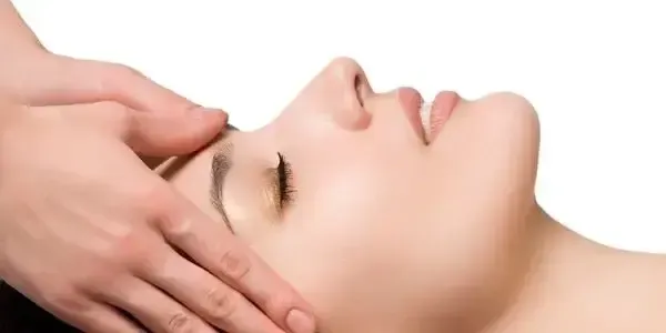 Woman receiving Reiki