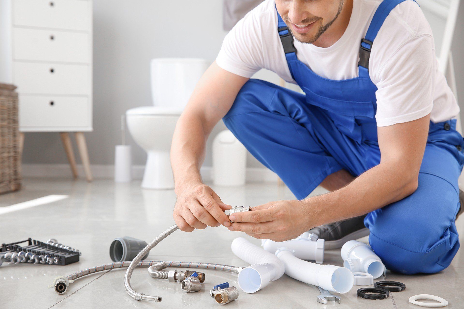 a plumber assembling parts