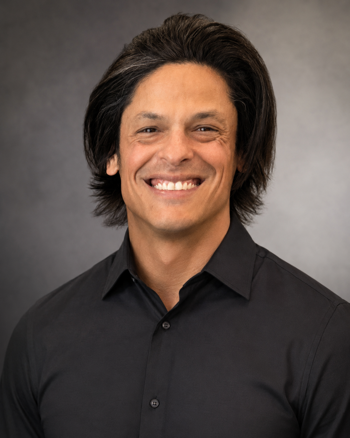 Professional headshot of Cisco Perez, licensed massage therapist at Performance Driven Therapy Centers.