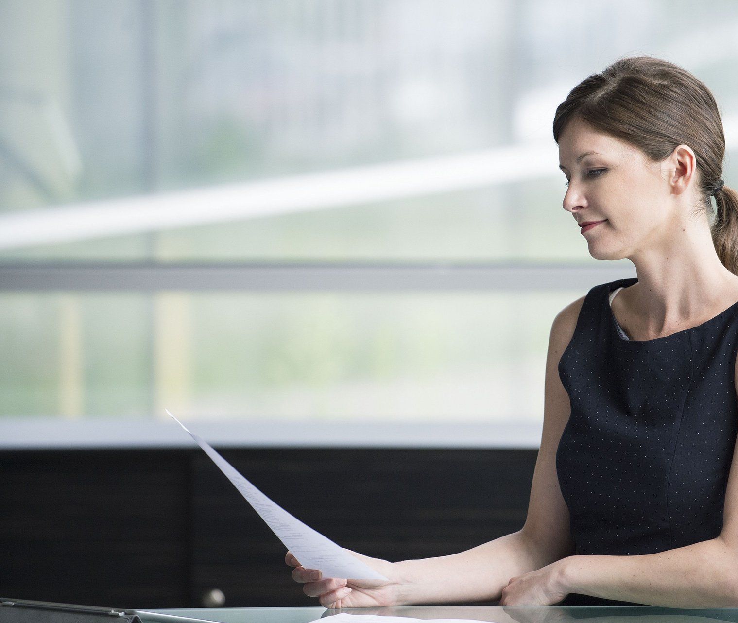 Girl looking at document