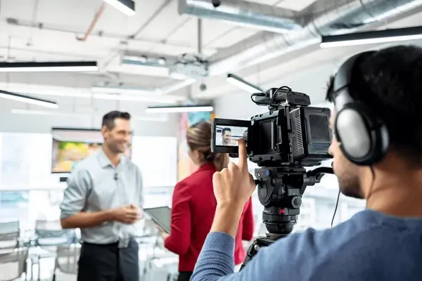 businessman happy wiht corporate videos