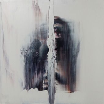 Stairs lead to a dark, mysterious-looking underground cave entrance in Dinkelsbühl. The entrance is divided in the middle by a vertical structure that splits the scene in two.