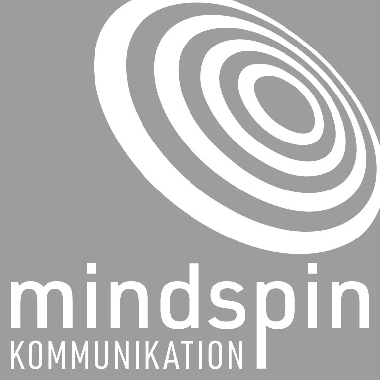 Spiralförmige Kreise in Weiß auf grauem Fond