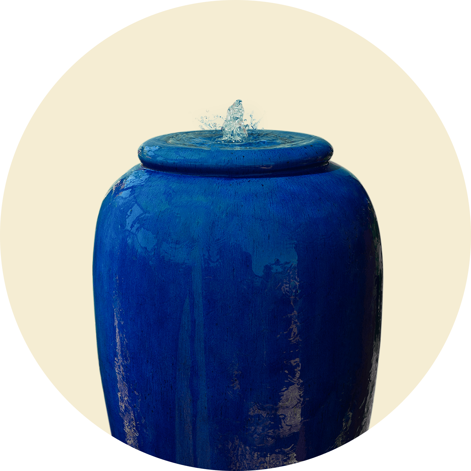 blue ceramic fountain with water bubbling