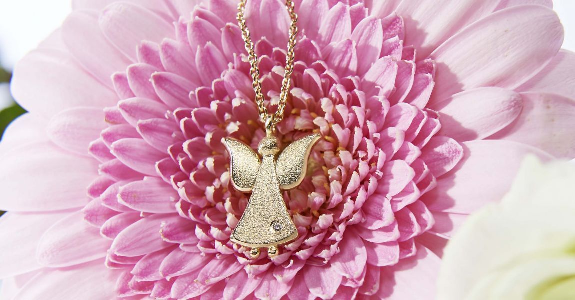 750/ Gelbgold sattgelb, Brillant weiß twvsi, Gravur möglich