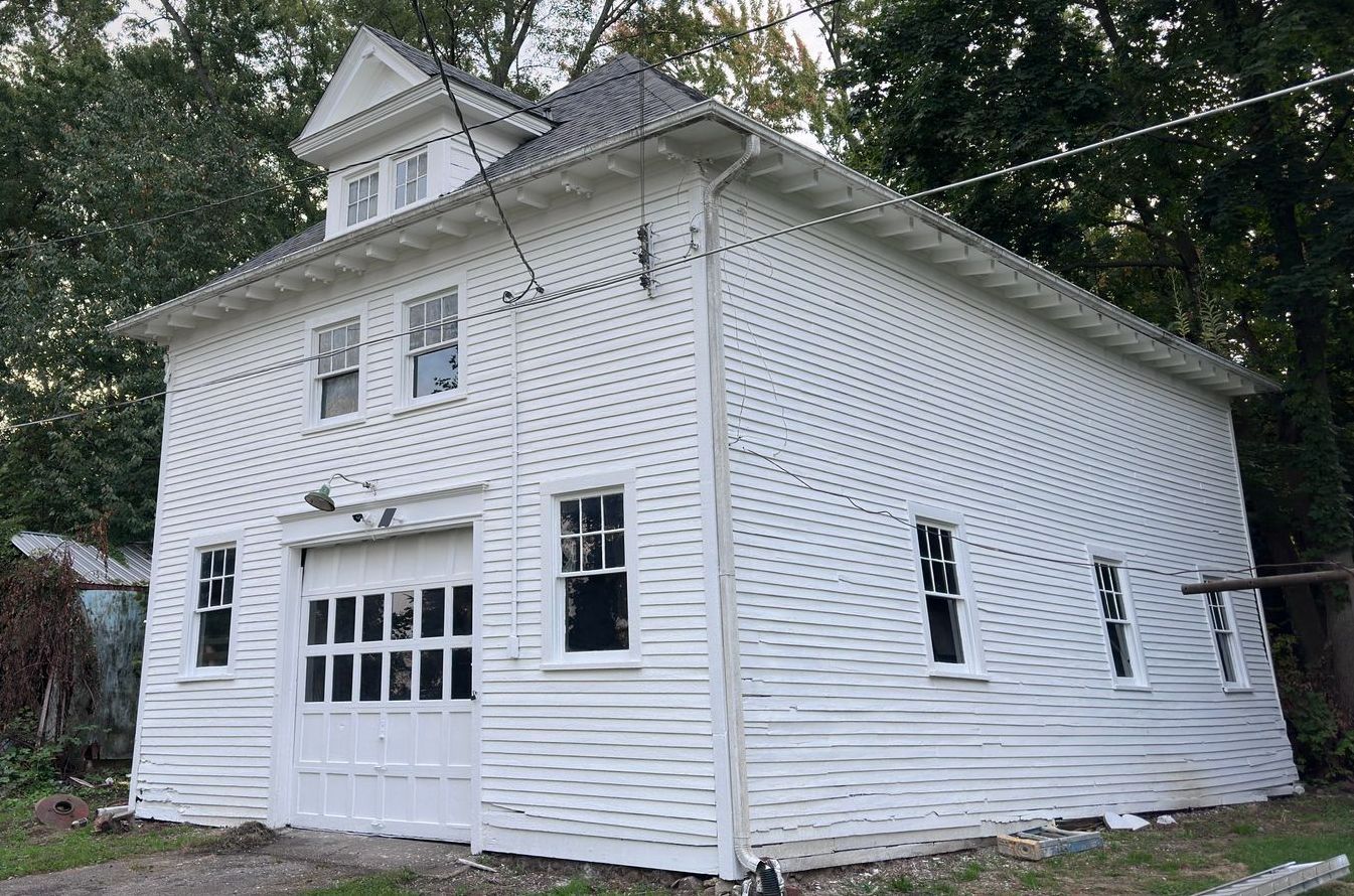 Garage Restoration before and after. After pic protects the house.