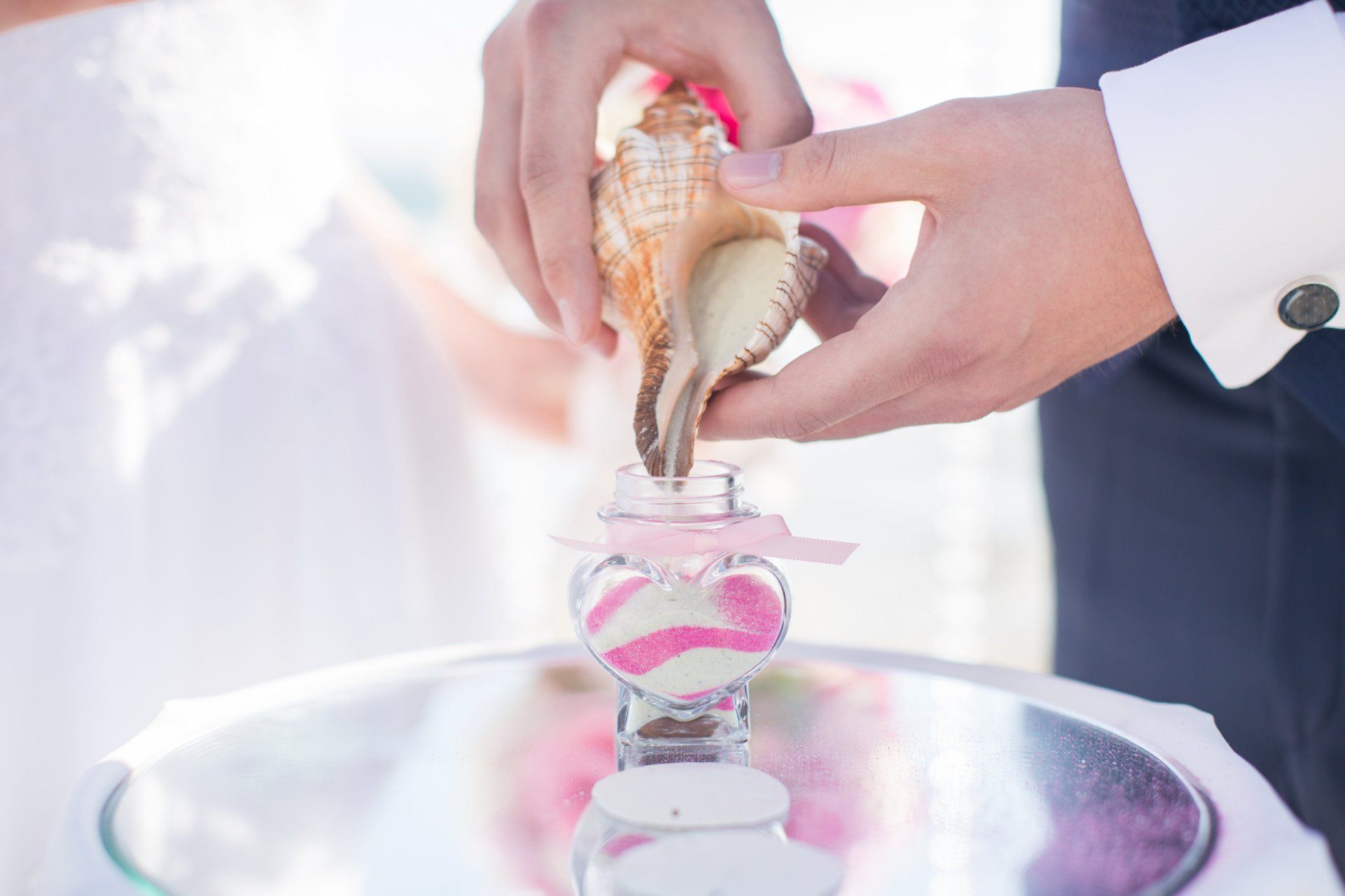 Strandhochzeit mit Unity Sand Ceremony pink weiß