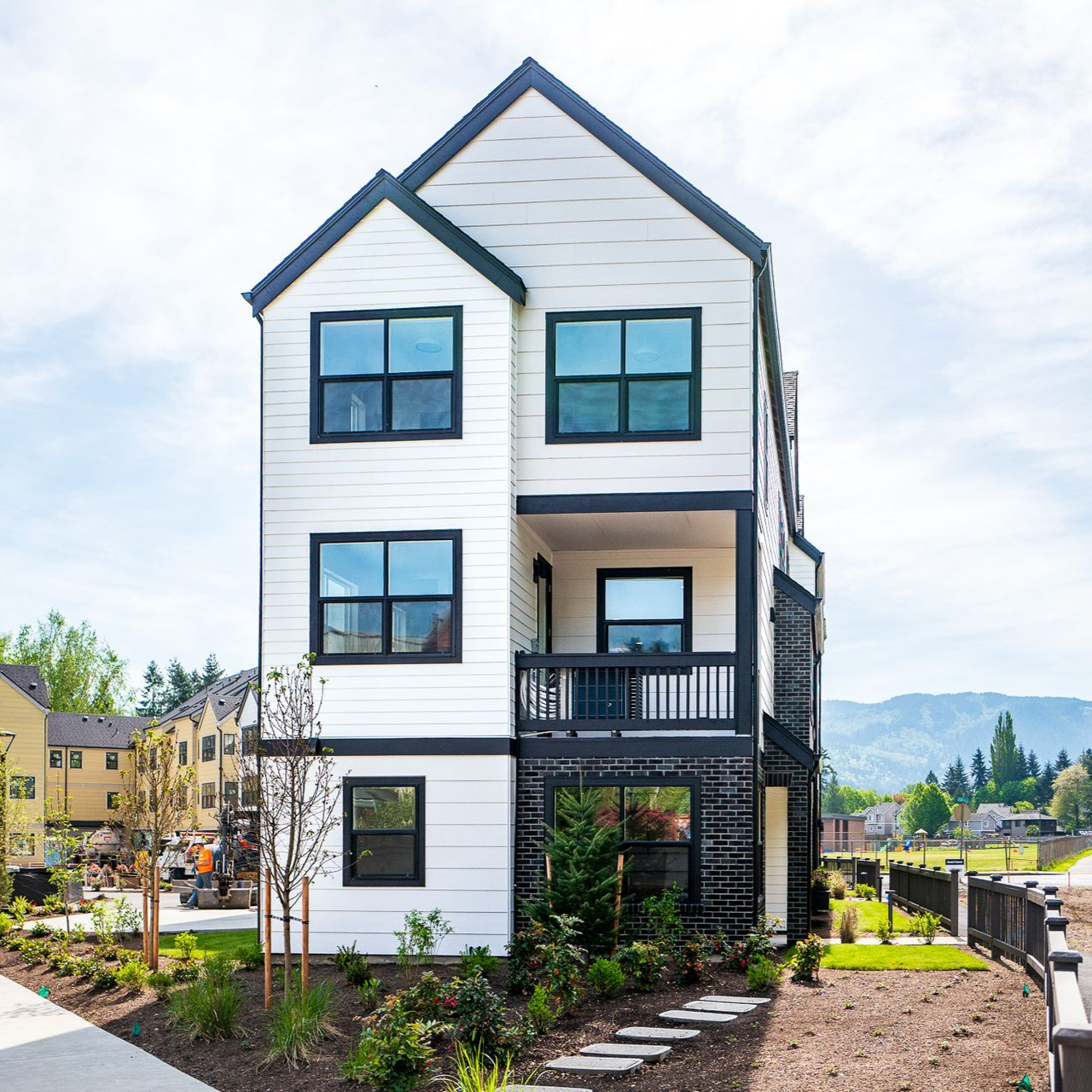 Modern custom home featuring James Hardie fiber cement siding and professional exterior installation by Bowen Contractors in the Seattle area.