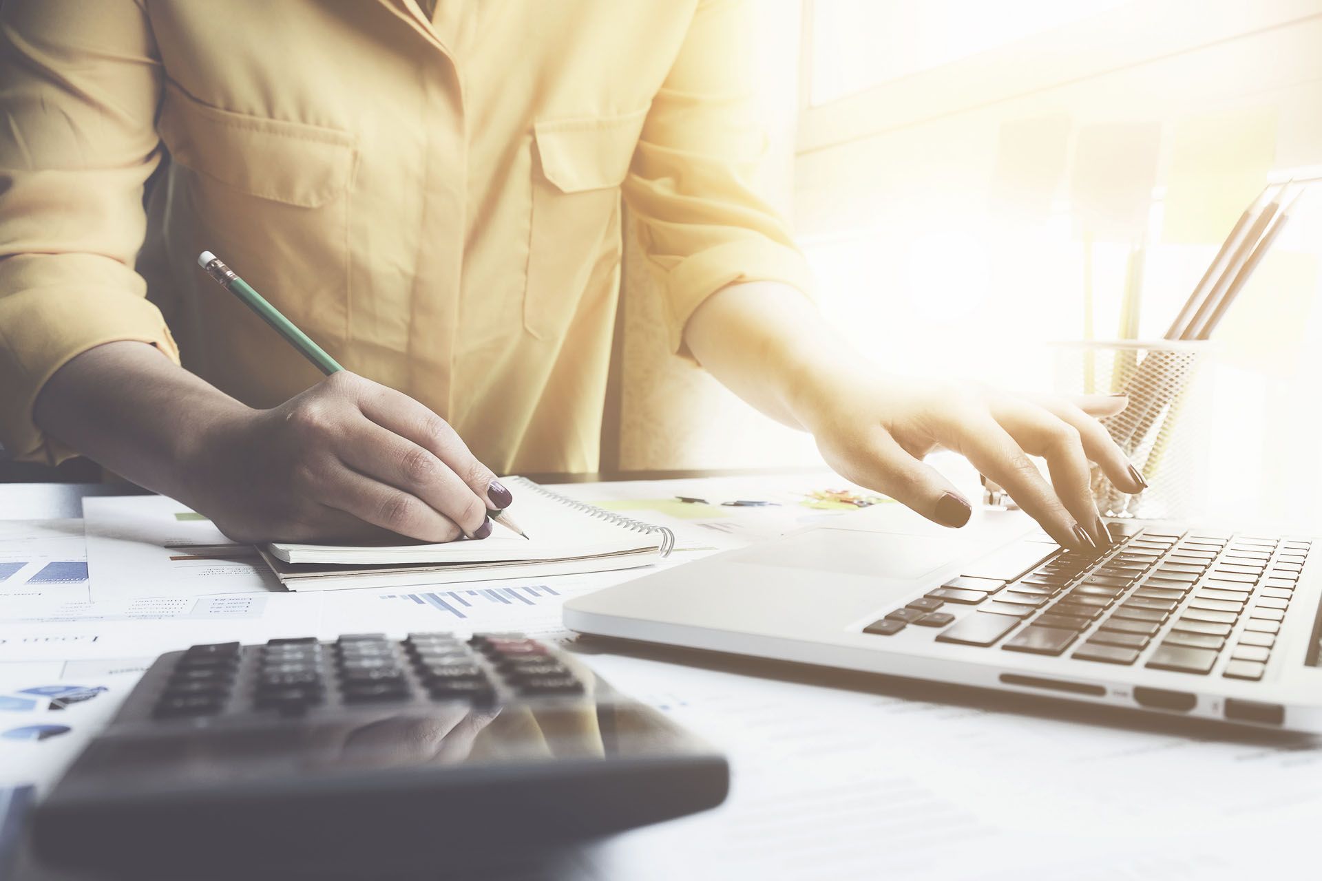 Women using laptop to access online money account