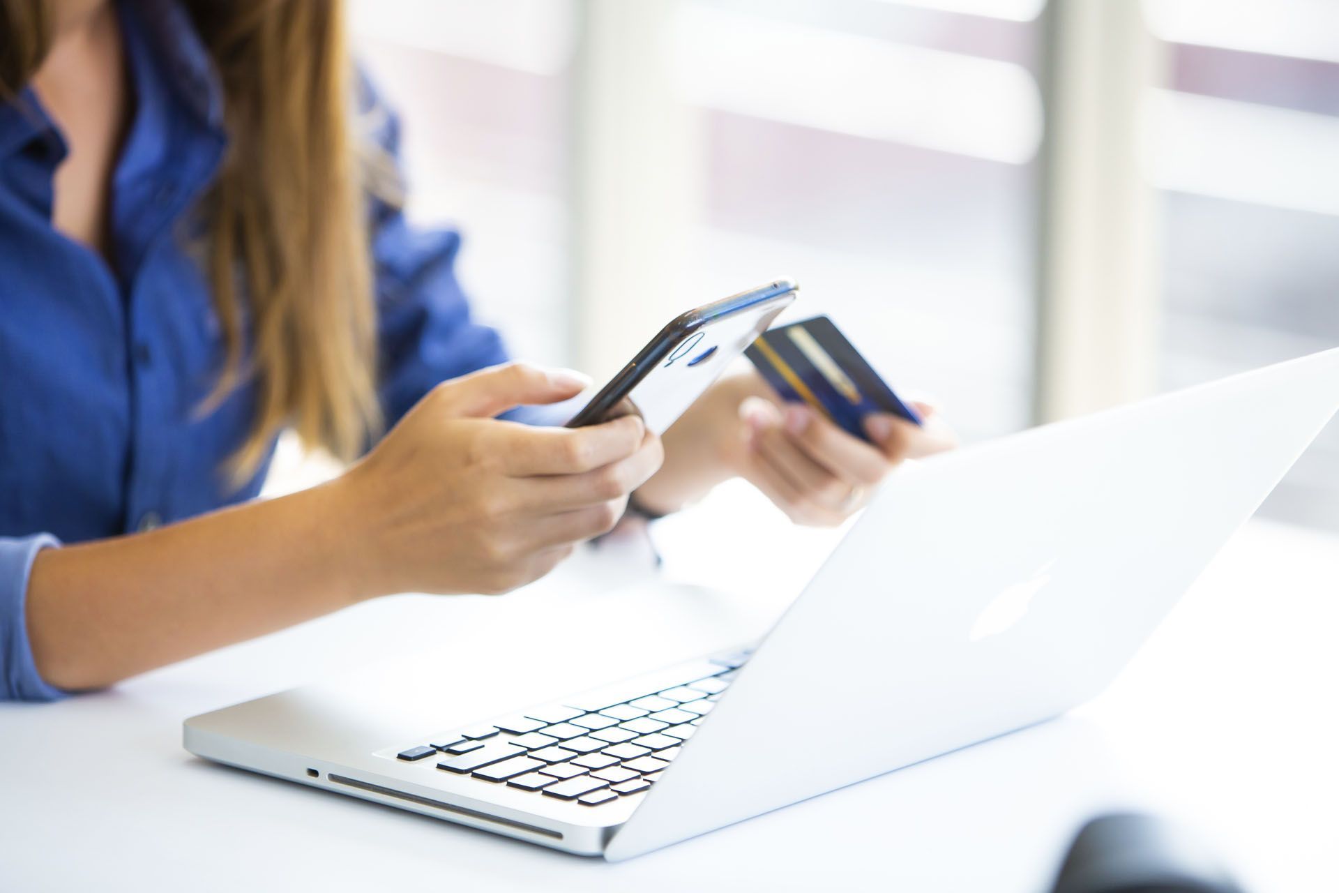 women hand holding smartphone using secure authentication