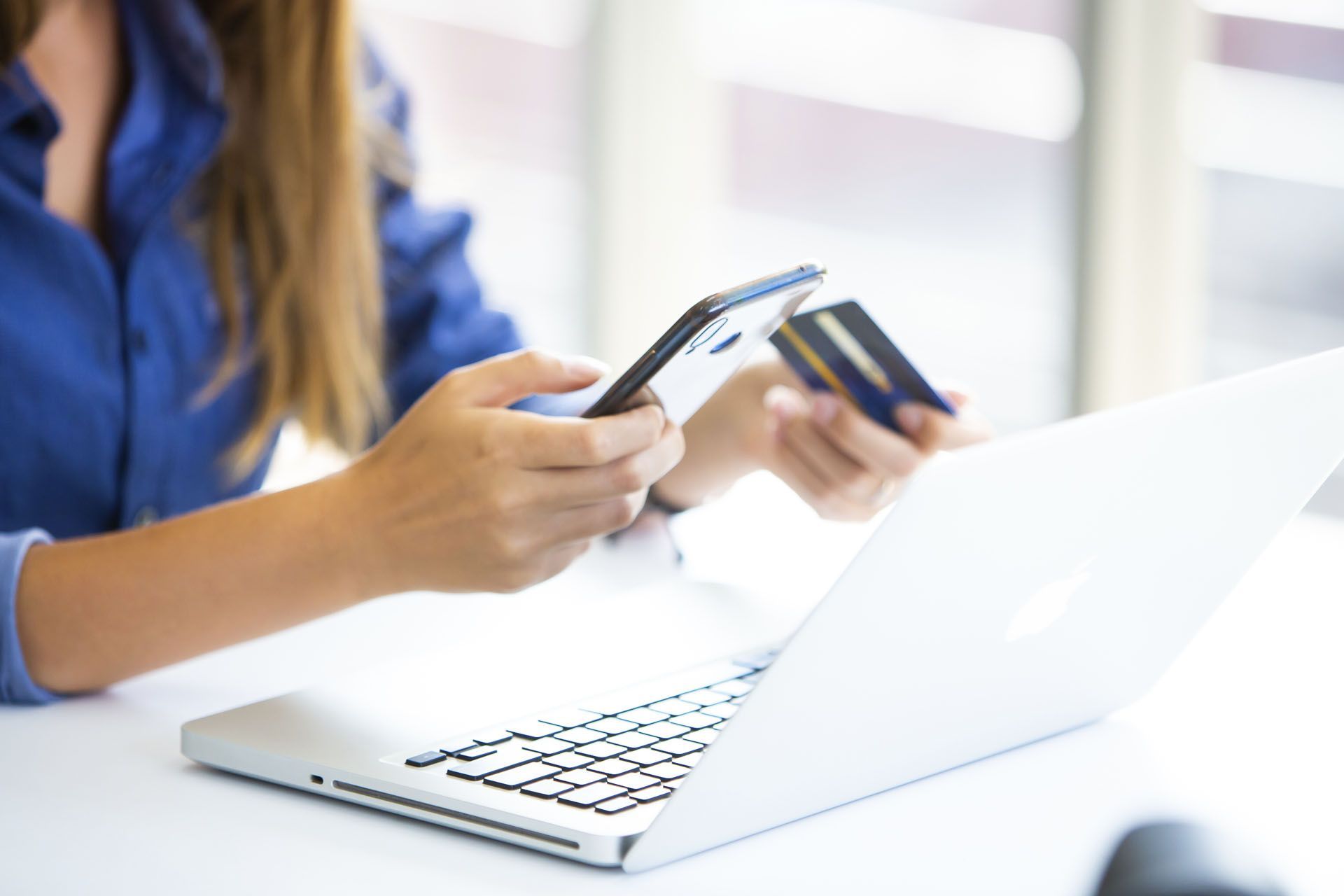 women hand holding smartphone using secure authentication